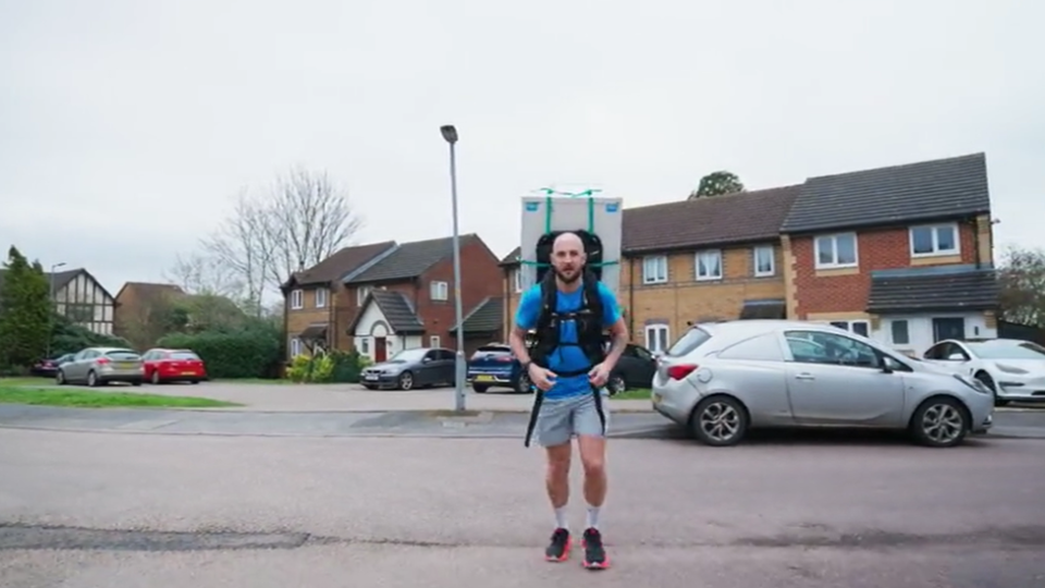 Fridge carrying marathon runner