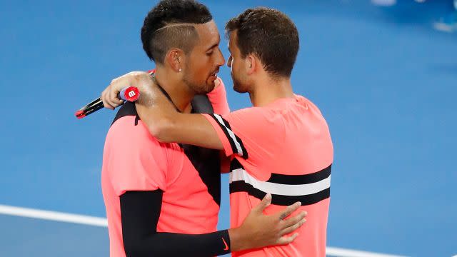 Kyrgios and Dimitrov embraced at the net. Image: Getty