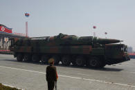 <p>A rocket is carried by a military vehicle during a military parade to celebrate the centenary of the birth of North Korea’s founder Kim Il Sung in Pyongyang, April 15, 2012. (Bobby Yip/Reuters) </p>