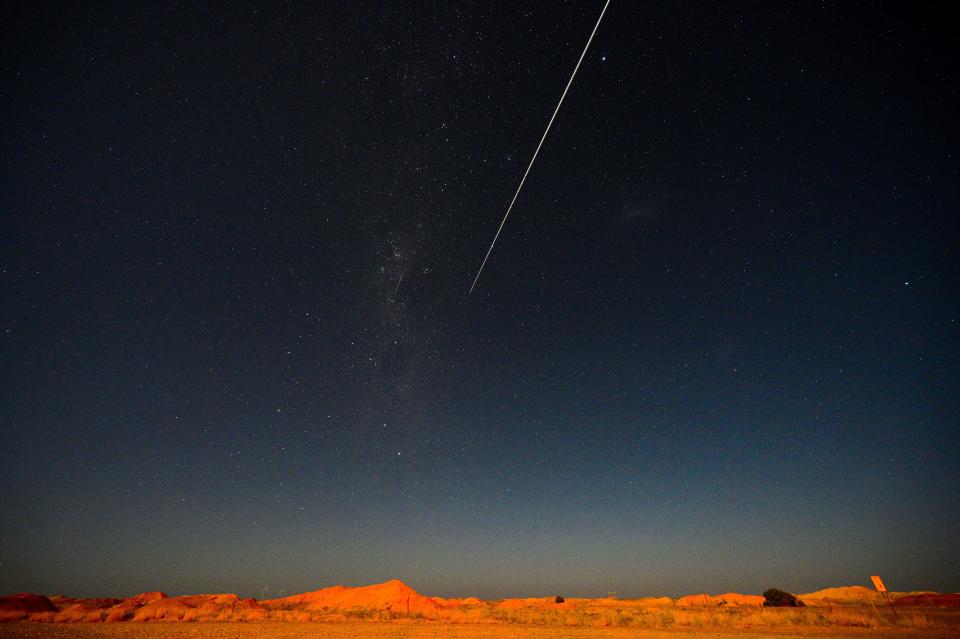 JAXA's Hayabusa2 probe's sample drop to earth, as seen from Coober Pedy in South Australia on December 6, 2020.  / Credit: MORGAN SETTE/AFP via Getty Images