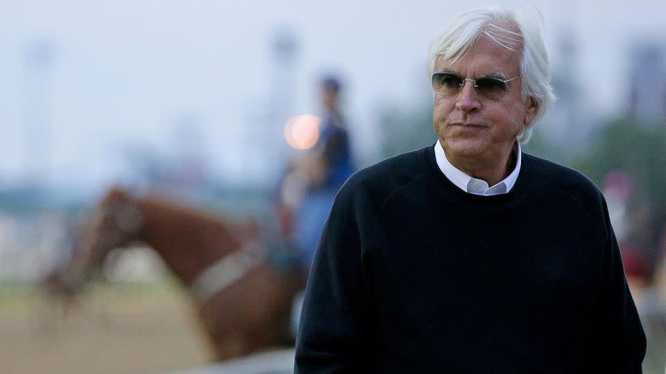 Trainer Bob Baffert watches a workout at Churchill Downs in 2016. - Charlie Riedel/AP