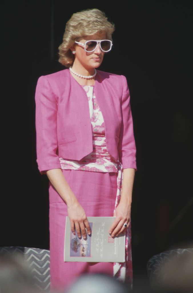 <p>Diana had <a href="https://www.townandcountrymag.com/society/tradition/g37374670/royal-family-pink-fashion-photos/" rel="nofollow noopener" target="_blank" data-ylk="slk:a pink moment;elm:context_link;itc:0;sec:content-canvas" class="link ">a pink moment</a> during a trip to Sydney, Australia in January 1988. The Princess chose a cropped pink blazer, a matching skirt, and a bold pair of sunglasses for this outing.<br></p>