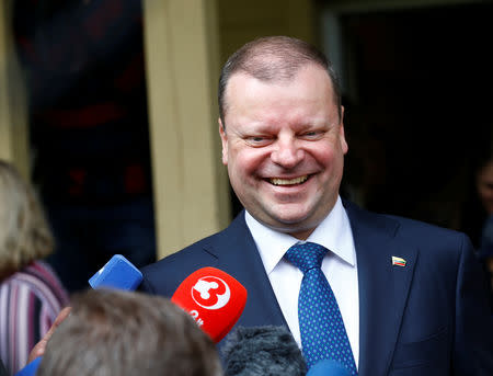 Prime Minister and presidential candidate Saulius Skvernelis speaks to media during the first round of Lithuanian presidential election in Vilnius, Lithuania May 12, 2019. REUTERS/Ints Kalnins