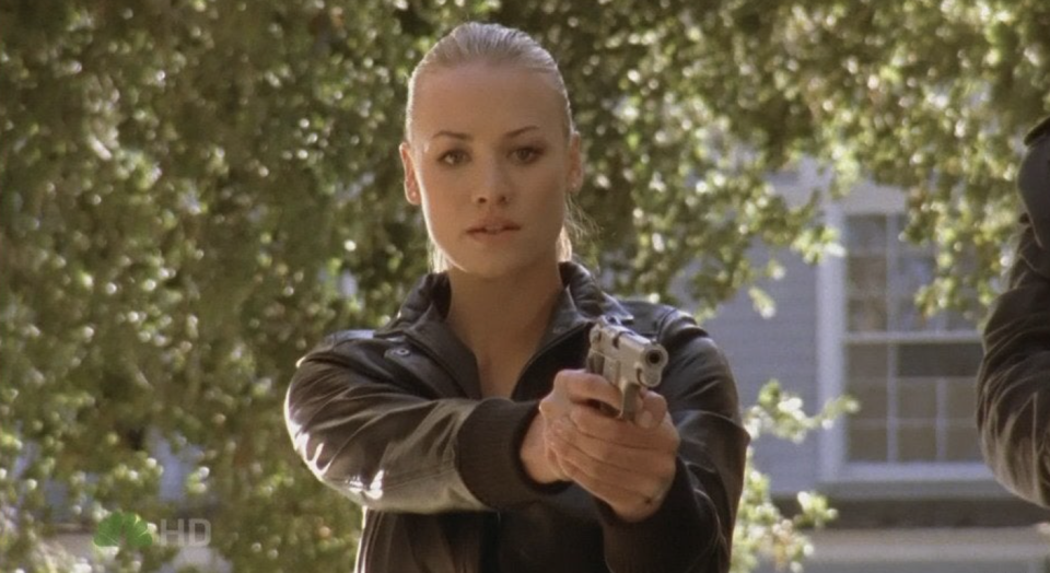 Yvonne in "Chuck" holding a gun