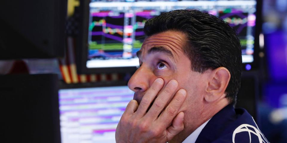 FILE - In this Aug. 12, 2019, photo specialist Peter Mazza works at his post on the floor of the New York Stock Exchange. Stocks of companies that do lots of business with China are obvious targets to sell when trade worries rise, and they’ve lagged sharply behind the rest of the market whenever President Donald Trump sends out a tariff tweet. But investors are also looking way beyond these first-order effects, as they pick out which stocks look most vulnerable to the trade war.