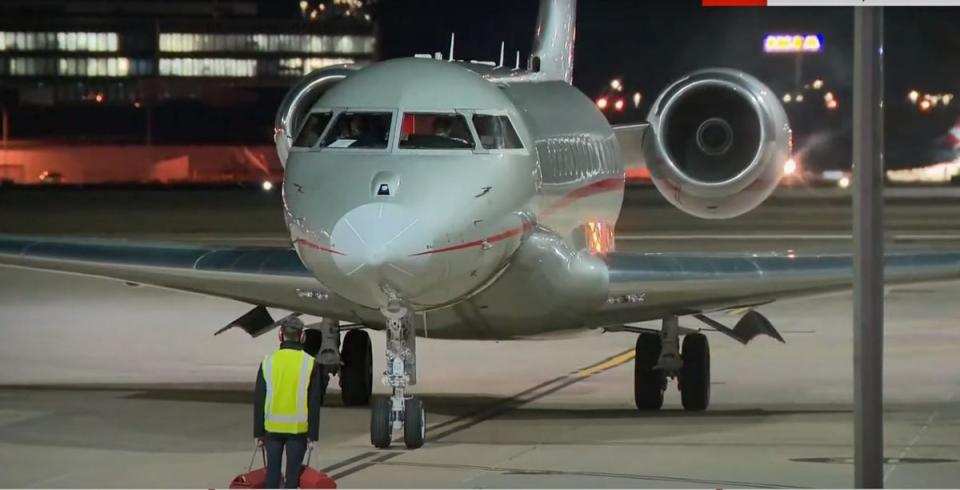 The plane carrying WikiLeaks founder Julian Assange lands at RAAF air base Fairbairn in Canberra, Australia (SKY NEWS)