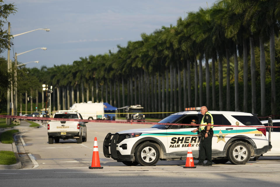 Police block off a road outside of the Trump International Golf Club in West Palm Beach, Fla., Monday. (Lynne Sladky/AP)