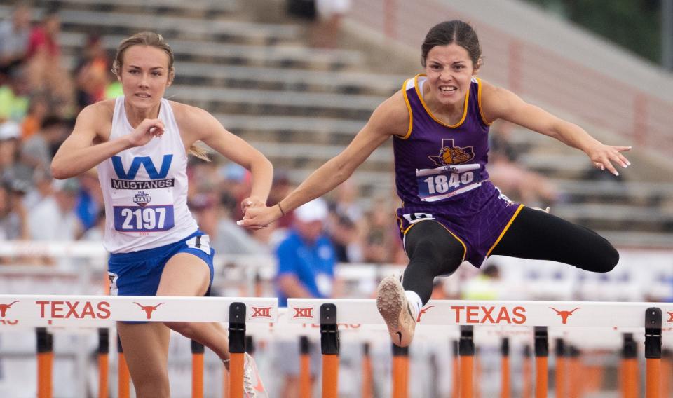 Moran's Alli Scott, right, clears the last hurdle in the 100-meter hurdles at the state meet Saturday at Mike A. Myers Stadium in Austin. Scott won with a time of 15.42 to defend her state title in the event.