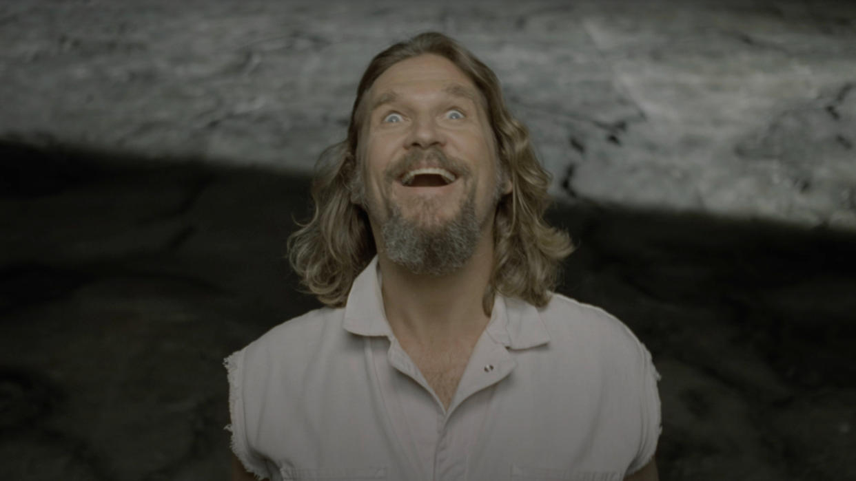  Jeff Bridges wearing a huge smile in The Big Lebowski. 