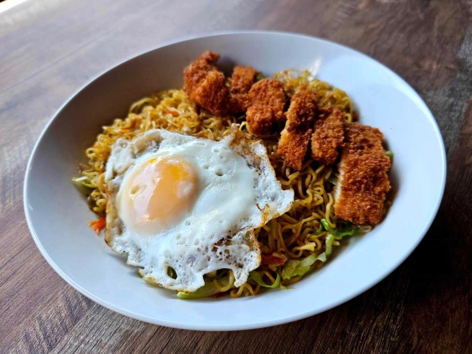 Mie Goreng is an Indonesian noodle dish stir-fried with vegetables and a sweet-savory sauce, then topped with egg and crisp fried chicken. It's an April special at Osaka restaurant in Newburgh.