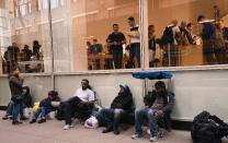 <p>People line up outside the 5th Avenue Apple store in order to get their hands on the new iPhone X (AFP Photo/Don Emmert) </p>