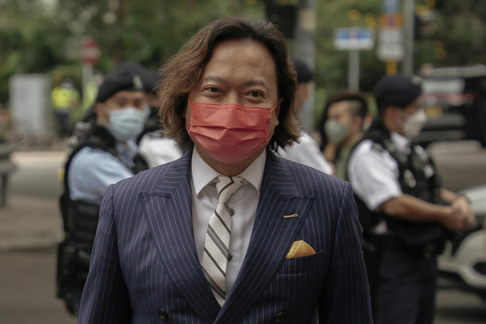 Pro-democracy activist Lawrence Lau Wai-chung arrives at the West Kowloon Magistrates' Courts to attend his national security trial in Hong Kong, Monday, Feb. 6, 2023. Some of Hong Kong's best-known pro-democracy activists went on trial Monday in the biggest prosecution yet under a law imposed by China's ruling Communist Party to crush dissent. (AP Photo/Anthony Kwan)