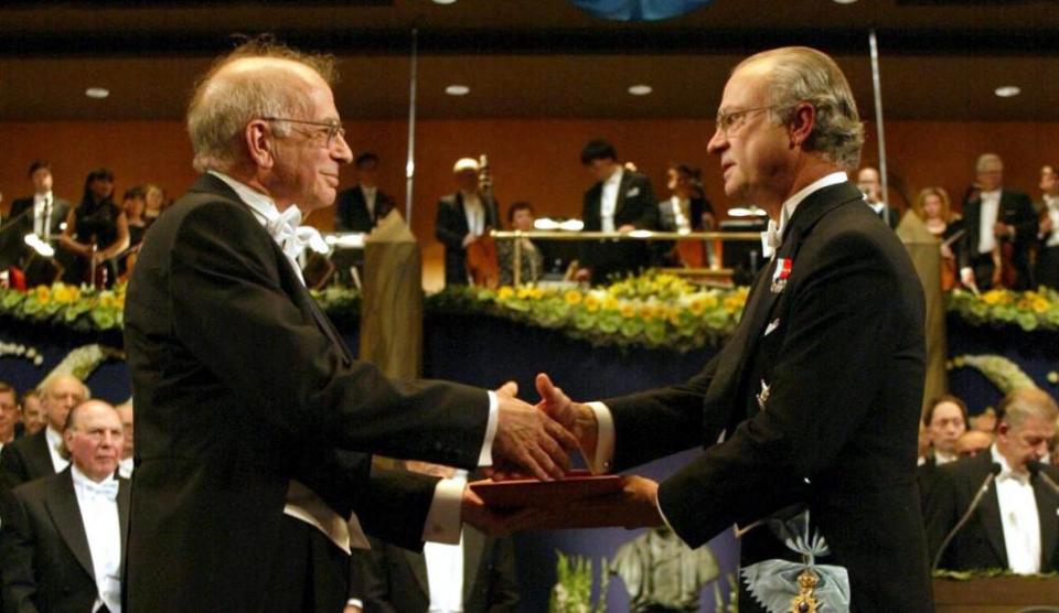 Daniel Kahneman receives the Nobel Memorial prize in Economic Sciences from King Carl Gustaf of Sweden in Stockholm, 2002.