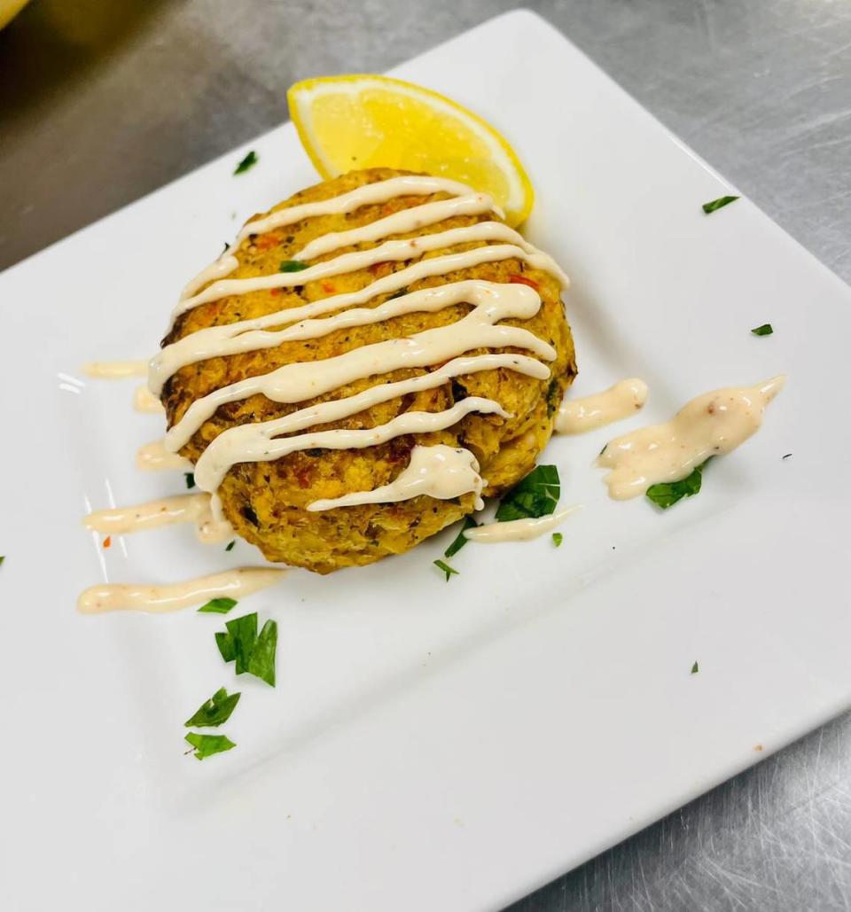 Using a recipe created by vegan chef and author of Flava My Plate cookbook, Dawn Hilton-Williams, the vegan krabby cakes are hearts of palm and chickpea-based served with two sides.