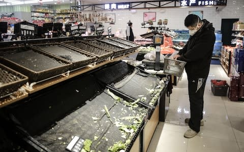 Shops have been emptied in Wuhan as people bunker down - Credit: Getty Images