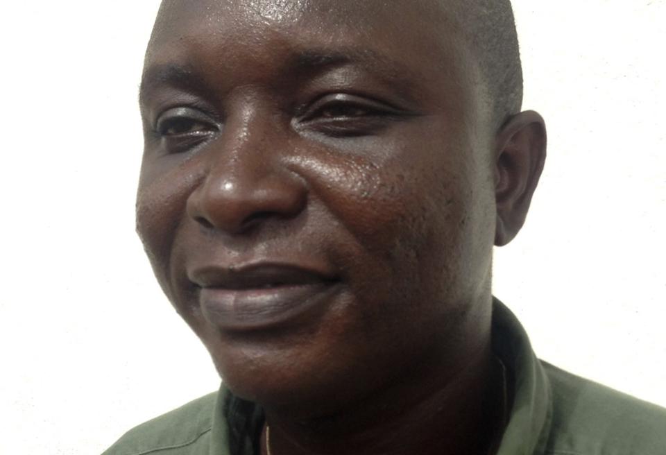 Sheik Umar Khan, head doctor fighting the deadly tropical virus Ebola in Sierra Leone, poses for a picture in Freetown, June 25, 2014. Khan, a Sierra Leonean virologist credited with treating more than 100 Ebola victims, has been transferred to a treatment ward run by medical charity Medecins Sans Frontieres after being infected by the Ebola virus, according to the statement released late on July 22, 2014 by the president's office. REUTERS/Umaru Fofana (SIERRA LEONE - Tags: HEALTH HEADSHOT)