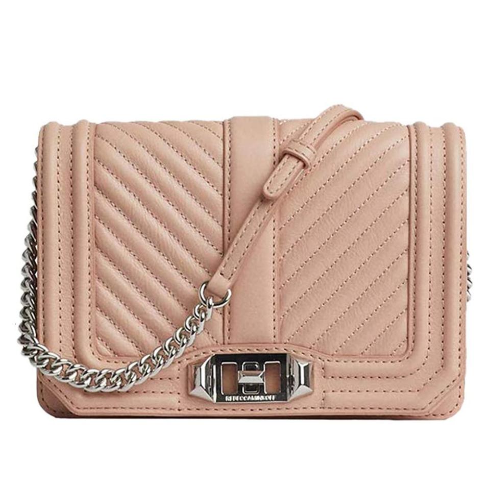 <p><strong>Rebecca Minkoff</strong></p><p>amazon.com</p><p><strong>$169.75</strong></p><p><a href="https://www.amazon.com/dp/B084MGGZ5P?tag=syn-yahoo-20&ascsubtag=%5Bartid%7C10049.g.34329922%5Bsrc%7Cyahoo-us" rel="nofollow noopener" target="_blank" data-ylk="slk:Shop Now;elm:context_link;itc:0;sec:content-canvas" class="link ">Shop Now</a></p><p>With quilted detailing and a charming chain strap, this classic crossbody will never go out of style. (It's almost like the cool, younger sister of Chanel 2.55 purse.) </p>