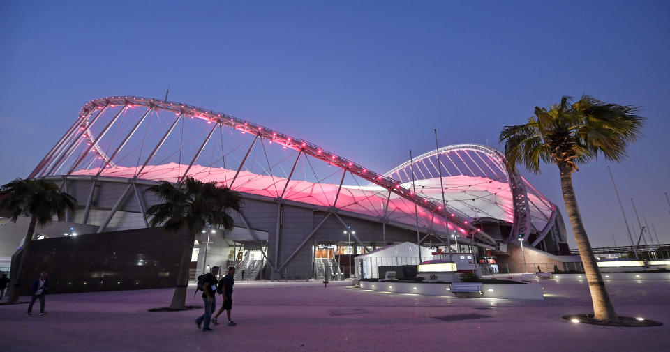 The Khalifa International Stadium shines in the evening prior to the start of the World Athletics Championships in Doha, Qatar, Thursday, Sept. 26, 2019. (AP Photo/Martin Meissner)