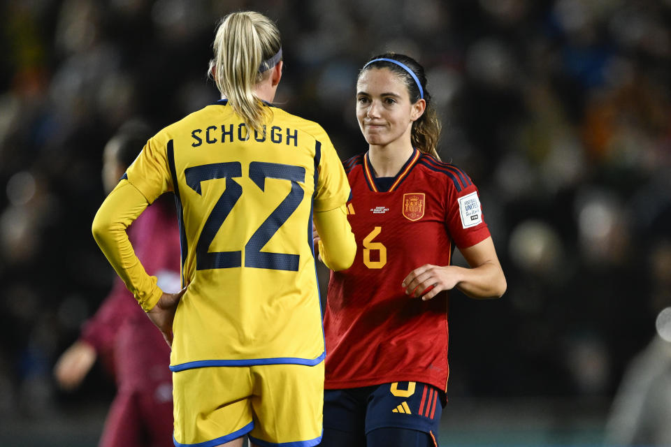 Sweden's Olivia Schough, left, congratulates Spain's Aitana Bonmati following the Women's World Cup semifinal soccer match between Sweden and Spain at Eden Park in Auckland, New Zealand, Tuesday, Aug. 15, 2023. (AP Photo/Andrew Cornaga)