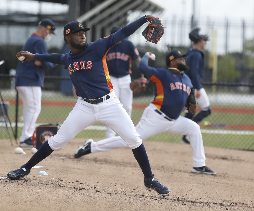 Houston Astros pitcher Cristian Javier (53) throws a bullpen session during spring training baseball in West Palm Beach, Fla., Monday, Feb. 22, 2021. (Karen Warren/Houston Chronicle via AP)