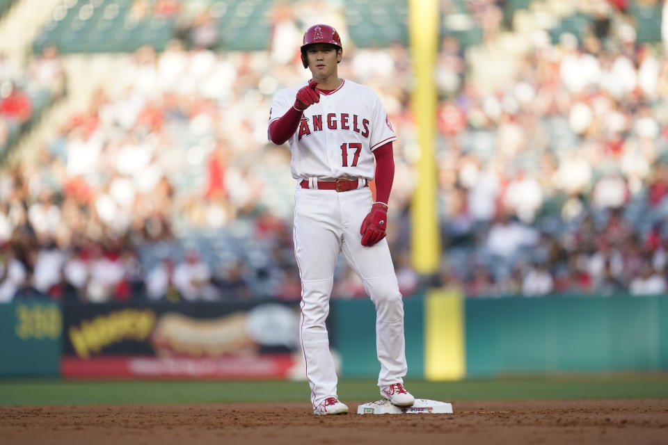 Los Angeles Angels designated hitter Shohei Ohtani (17) stands on second base during the first inning of a baseball game against the Boston Red Sox in Anaheim, Calif., Tuesday, June 7, 2022. (AP Photo/Ashley Landis)