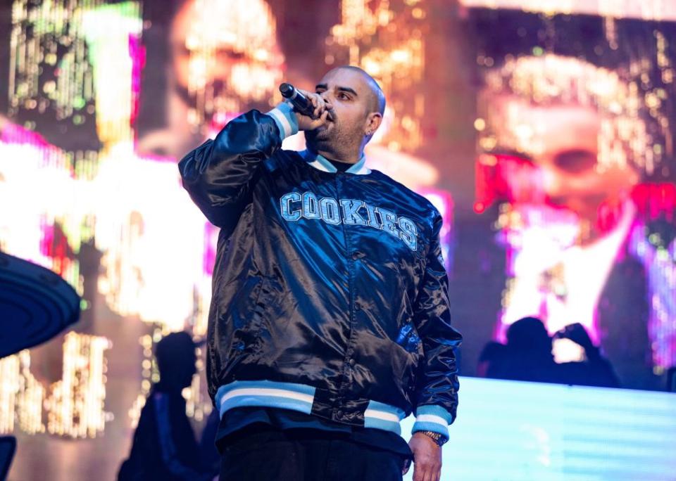 Berner performs onstage during the High Hopes Concert Series. His jacket has the word Cookies written on it.