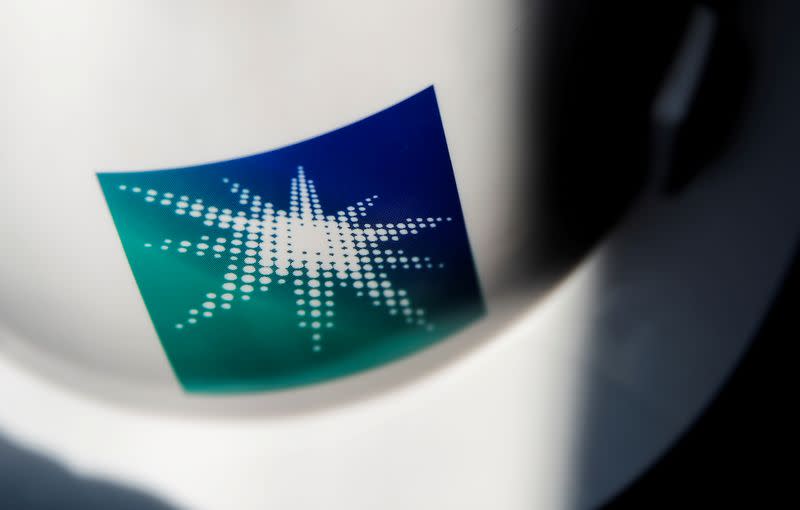 FILE PHOTO: A helmet with logo of Saudi Aramco is pictured at the oil facility in Abqaiq