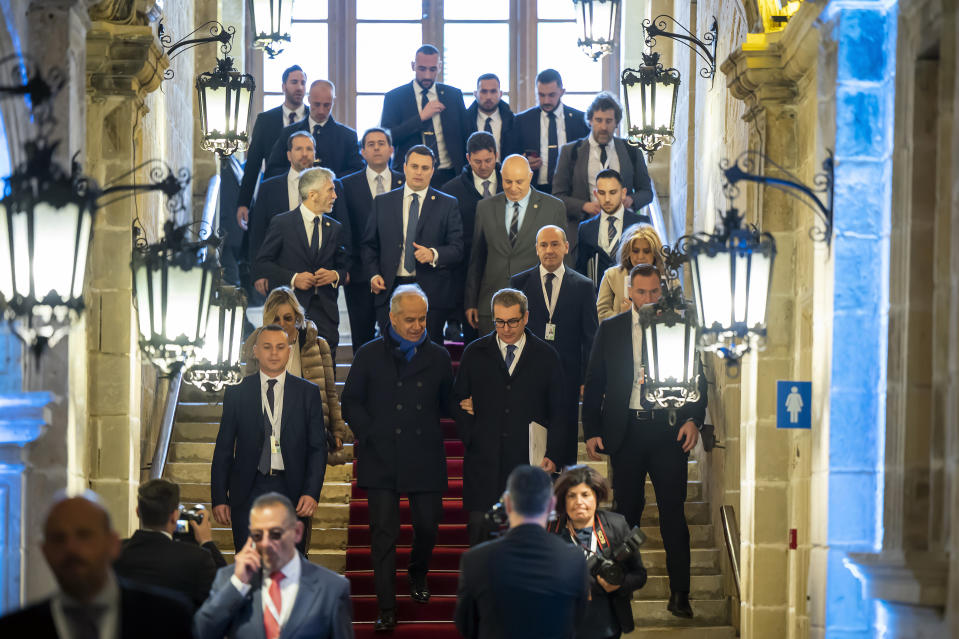 Participants at the "MED 5" interior ministers meeting arrive for a press conference in Valletta, Malta, Saturday, March 4, 2023. (AP Photo/Rene Rossignaud)