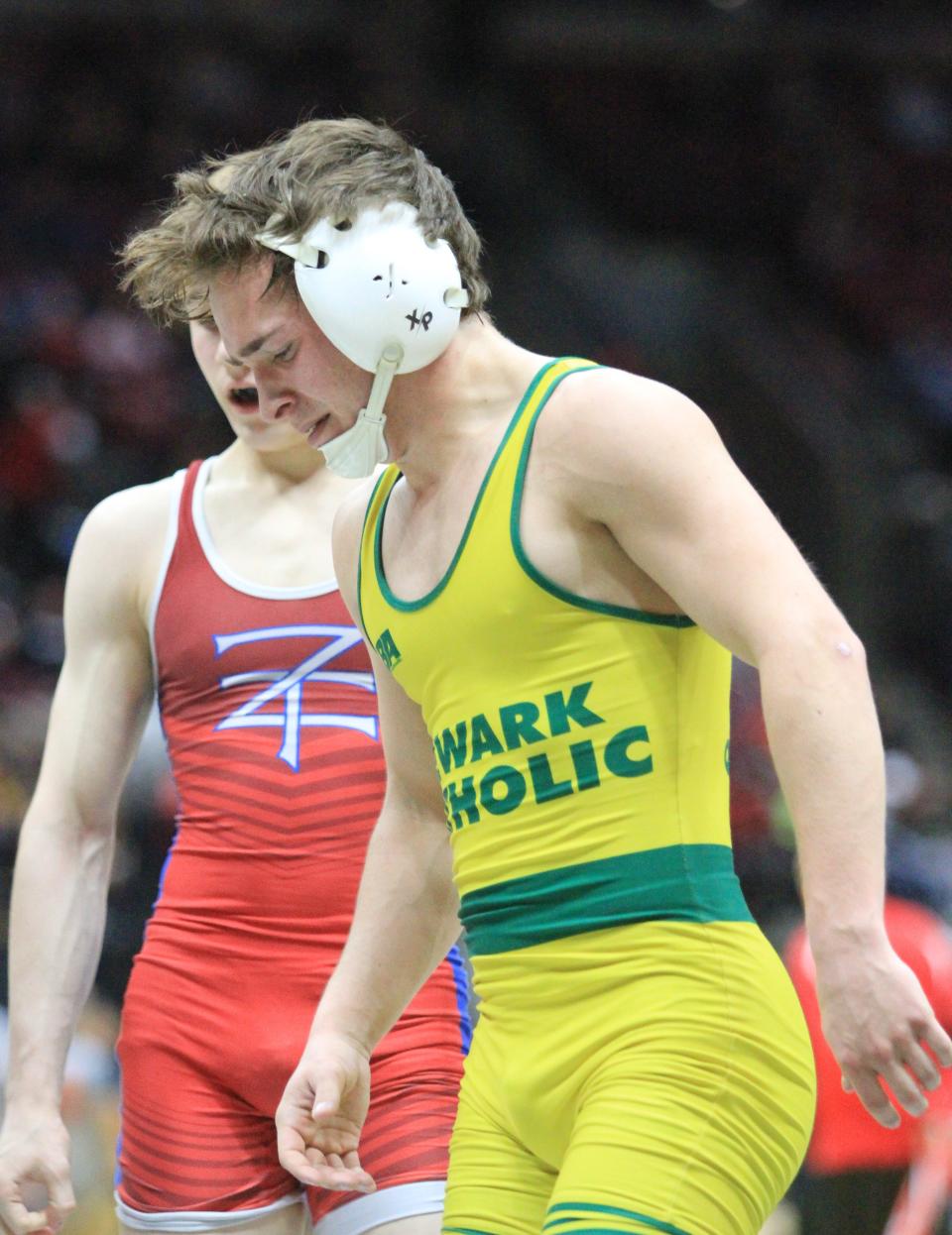 Newark Catholic's Brian Luft reacts to his loss in a 132-pound match during the Division III state championships at Ohio State's Schottenstein Center on Saturday, March 9, 2024.