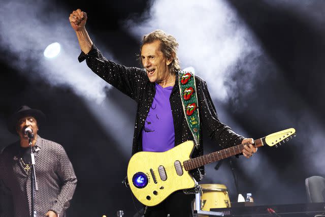 <p>Kevin Mazur/Getty Images for The Rolling Stones</p> Ronnie Wood performs on stage during The Rolling Stones' 'Hackney Diamonds' tour at NRG Stadium on April 28, 2024 in Houston