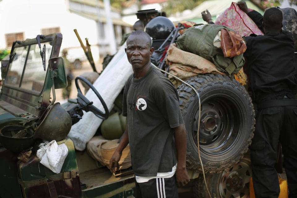 Seleka Muslim militias evacuate the Camp de Roux downtown Bangui, Central African Republic, Monday Jan. 27, 2014, to relocate and join other Selekas at the PK11 camp. The clearing out of Camp de Roux — normally the army's main base in the capital — comes more than two weeks after rebel leader-turned-president Djotodia surrendered power amid mounting international condemnation of his inability to stop sectarian bloodshed. A new interim civilian government has pledged to halt the violence and attempt to organize elections no later than February 2015. (AP Photo/Jerome Delay)