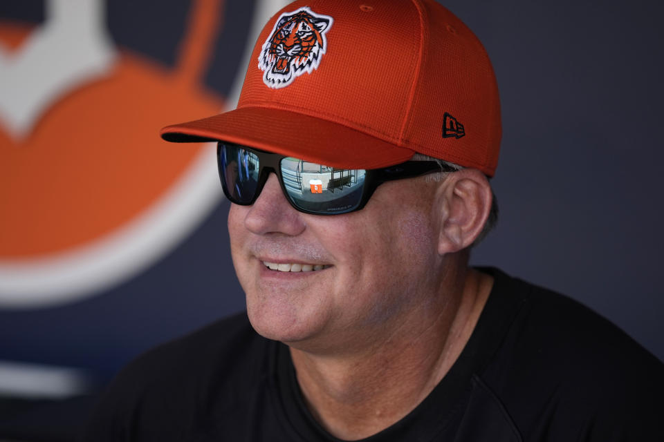 Detroit Tigers manager A.J. Hinch sits in the dugout before a spring training baseball game against the Pittsburgh Pirates Saturday, March 9, 2024, in Lakeland, Fla. (AP Photo/Charlie Neibergall)