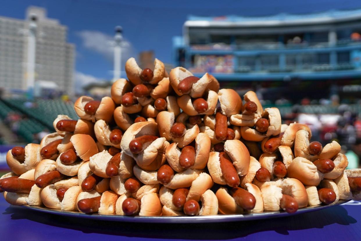 A large plate of hot dogs for the Nathan's Famous 4th Of July International Hot Dog Eating Contest