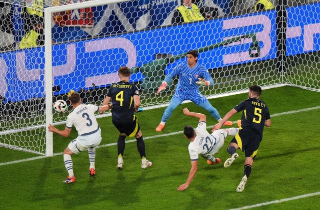 Grant Hanley's header hits the post as Switzerland goalkeeper Yann Sommer watches on unmoved