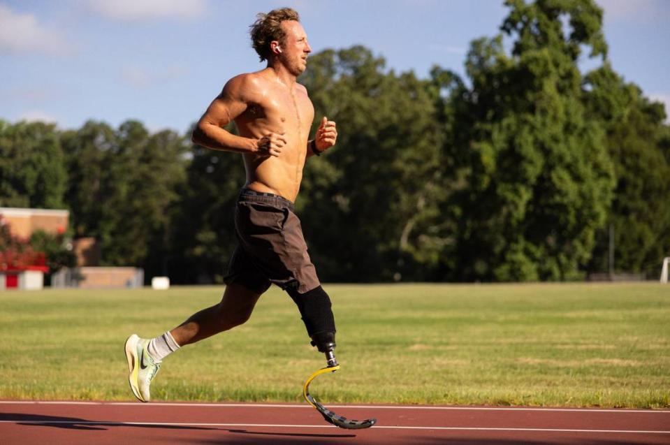 Carson Clough trains for the Paralympics triathlon at Alexander Graham Middle School in Charlotte, N.C., on Saturday, July 6, 2024.