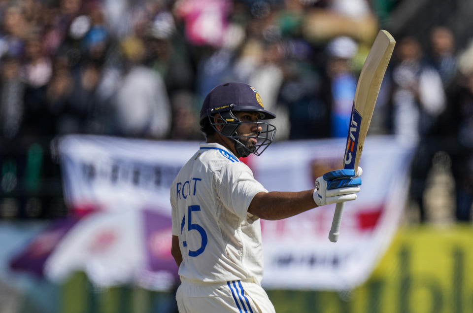 India's captain Rohit Sharma celebrates his hundred runs on the second day of the fifth and final test match between England and India in Dharamshala, India, Friday, March 8, 2024. (AP Photo/Ashwini Bhatia)