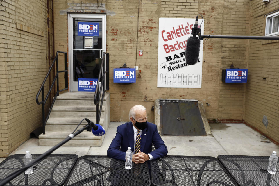 Democratic presidential candidate, former Vice President Joe Biden meets with with small business owners, Wednesday, June 17, 2020, at Carlette's Hideaway, a soul food restaurant, in Yeadon, Pa. (AP Photo/Matt Slocum)