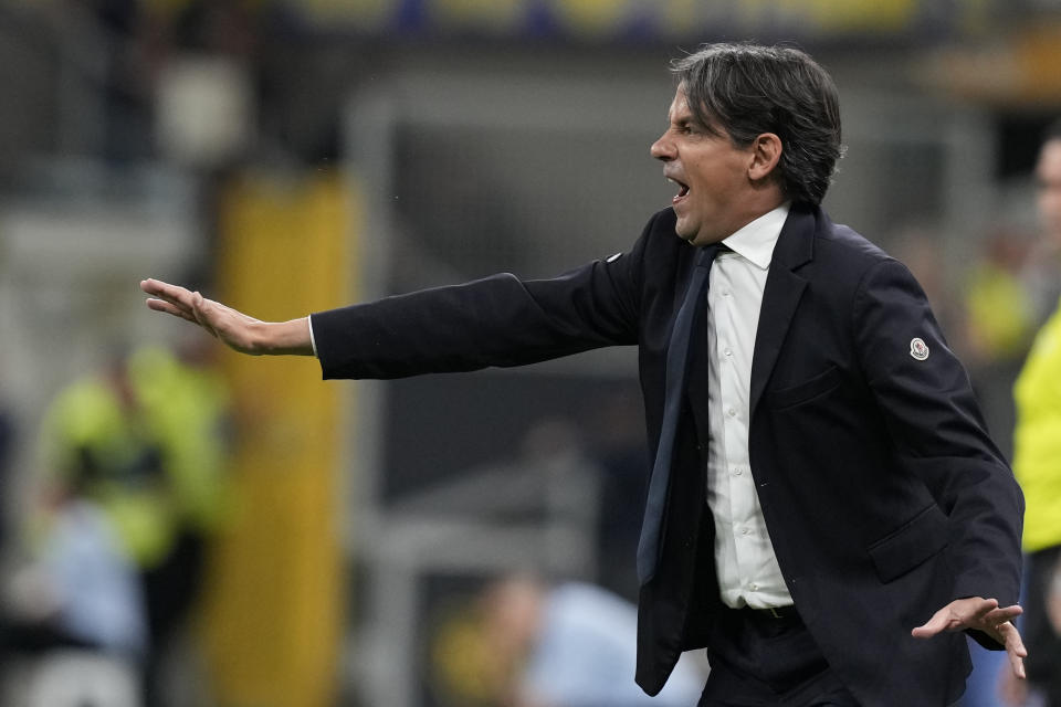 Inter Milan's head coach Simone Inzaghi yells during the Italian Serie A soccer match between Inter Milan and Cagliari at the San Siro stadium in Milan, Italy, Sunday, April 14, 2024. (AP Photo/Antonio Calanni)