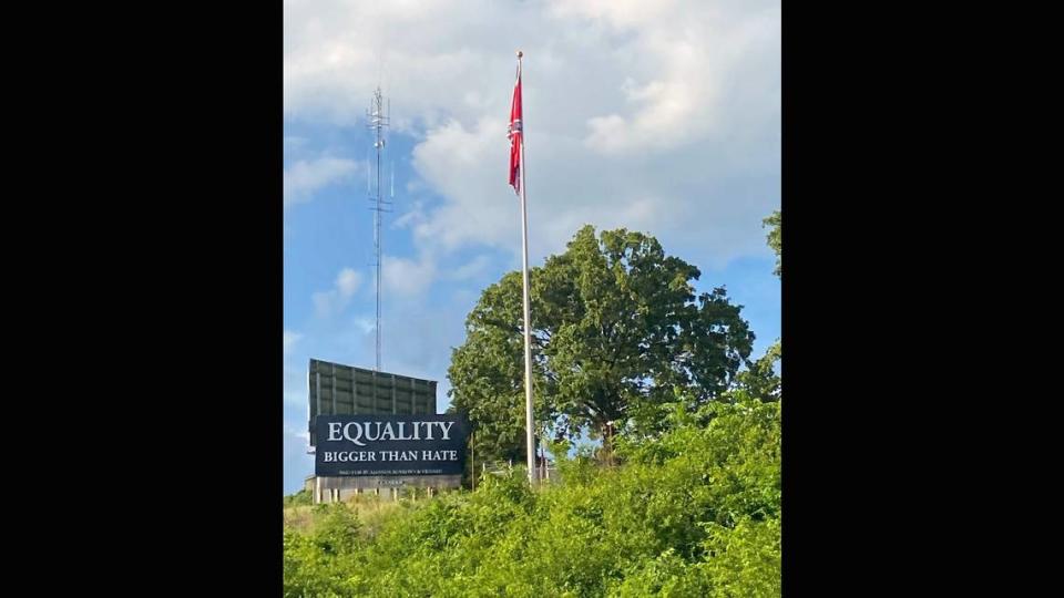 Amanda Burrows of Tuscumbia, Missouri, has raised $5,000 to fund an anti-racism message on a billboard near the base of a giant Confederate flag erected this past winter along a popular highway to the Lake of the Ozarks.