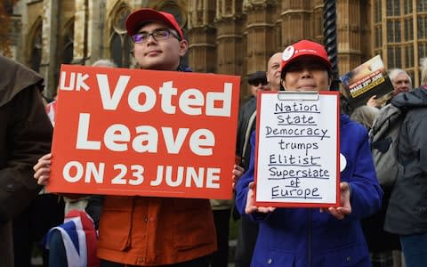 A pro-Brexit demonstration outside parliament - Credit: Charlotte Ball/PA Wire