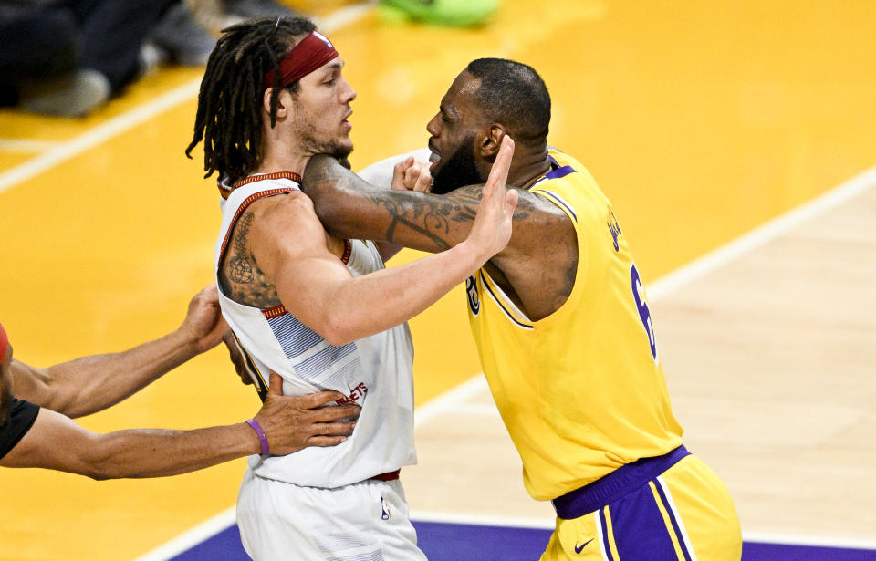 LOS ANGELES, CA - MAY 22: Los Angeles Lakers forward LeBron James, right, and Denver Nuggets forward Aaron Gordon get into a scuffle during the second quarter of game four in the NBA Playoffs Western Conference Finals at Crypto.com Arena on Monday, May 22, 2023 in Los Angeles, CA. (Gina Ferazzi / Los Angeles Times via Getty Images)