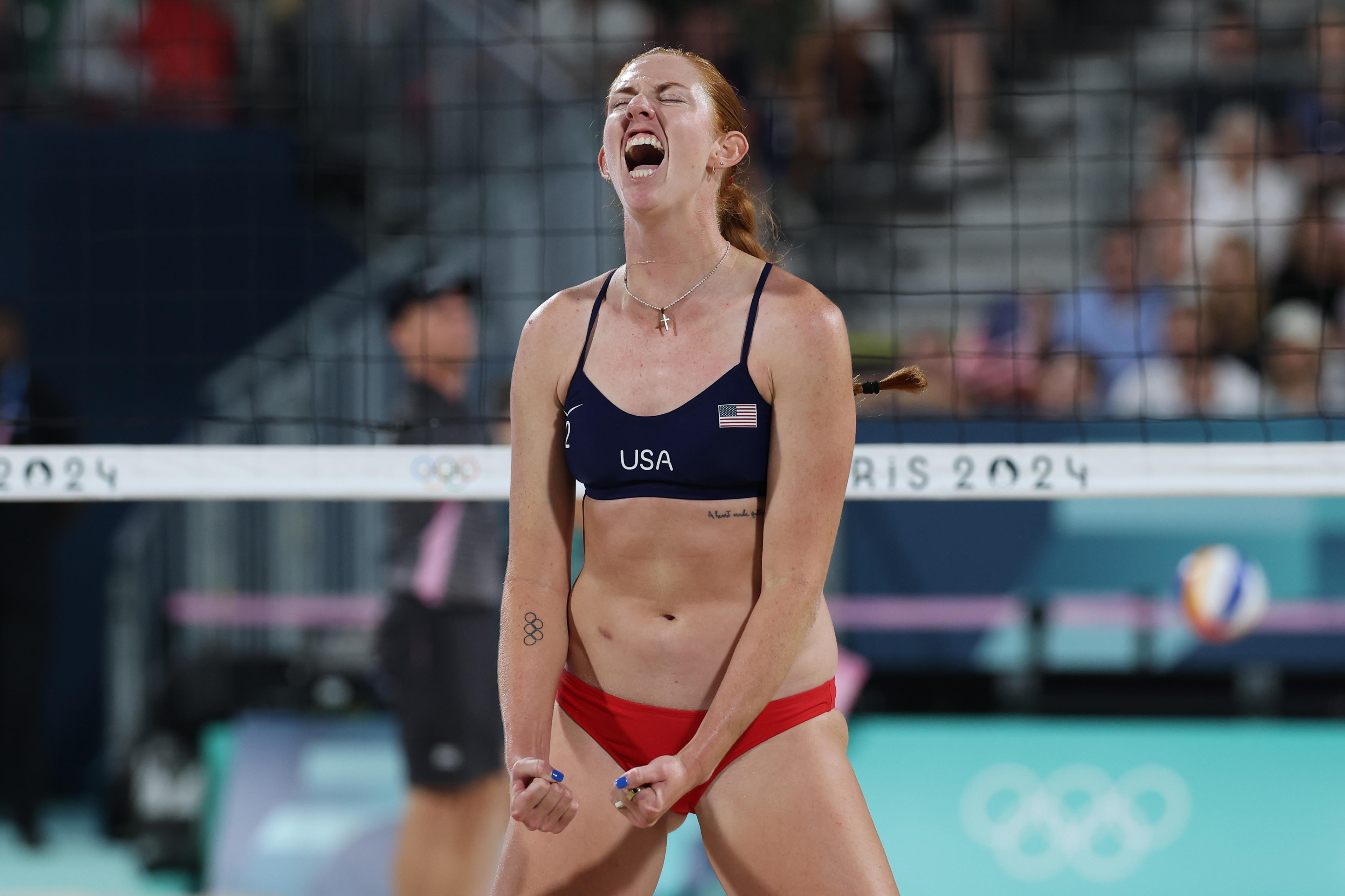 Kelly Cheng of Team United States reacts during a Women's Preliminary Phase match against Team Germany on day seven of the Olympic Games Paris 2024 at Eiffel Tower Stadium on August 02, 2024 in Paris, France. (Elsa/Getty Images)