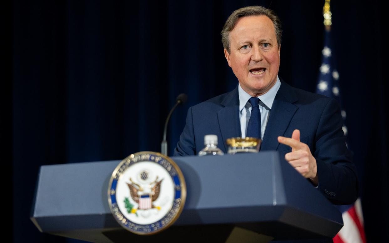 Lord Cameron, the Foreign Secretary, is pictured yesterday during a press conference in Washington DC