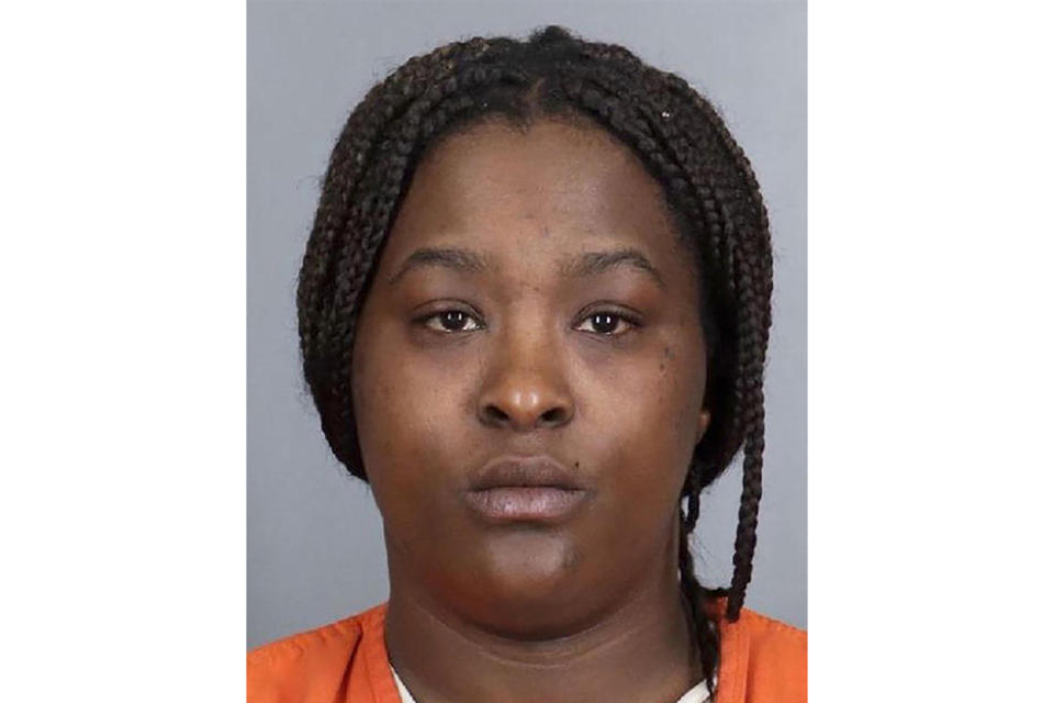 This booking photo provided by the 18th Judicial District Attorney's Office shows Kiarra Jones. Jones, a school bus aide shown on surveillance video hitting a non-verbal autistic boy, has been charged with 10 more counts of abuse involving two children, prosecutors said Friday, May 3, 2024. (18th Judicial District Attorney's Office via AP)