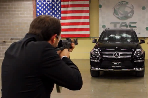 Bulletproof car shot with AK-47