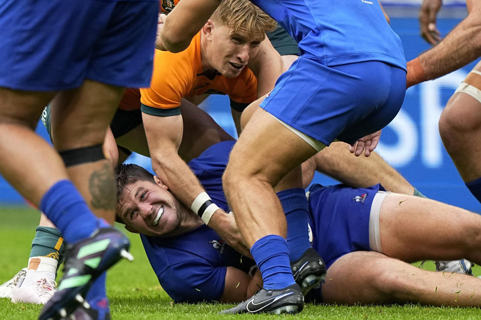 France's Julien Marchand defends the ball during the International Rugby Union World Cup warm-up match between France and Australia at the Stade de France stadium in Saint Denis, outside Paris, Sunday, Aug. 27, 2023. (AP Photo/Michel Euler)