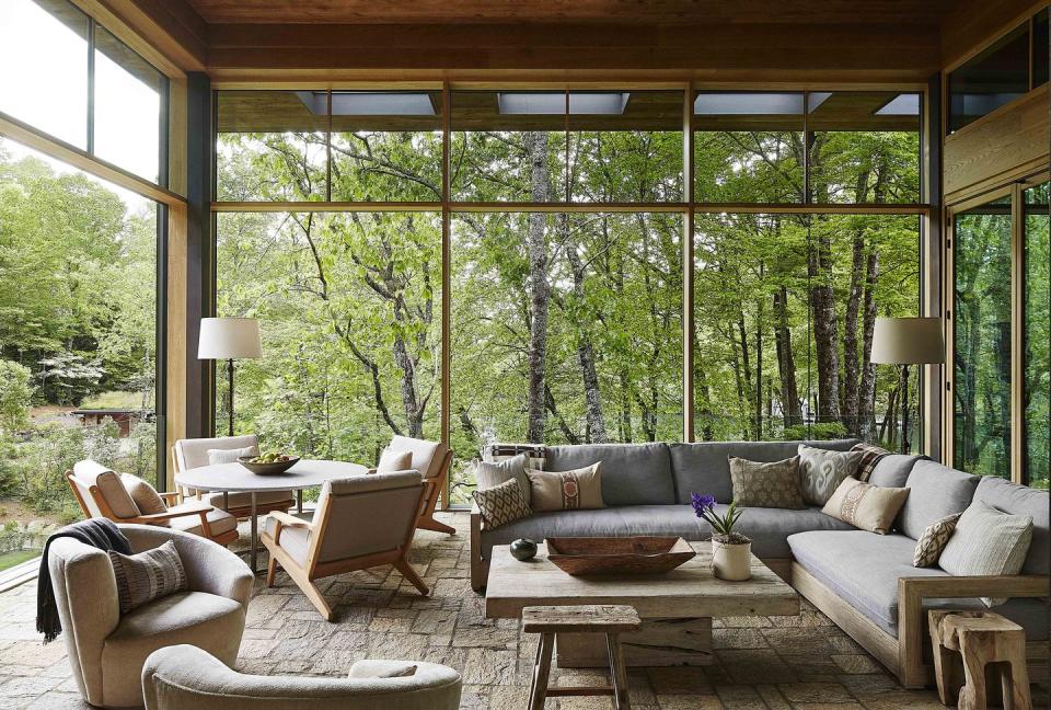 seating area with sofas and chairs and a view of the mountain landscape