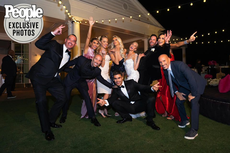 <p>Of course, Heather's <em>Selling Sunset</em> castmates came to celebrate her special day! Seen here (from left to right), is the show's creator Adam DiVello, Jason Oppenheim, Chrishell Stause, Mary Fitzgerald, show producer Skyler Wakil, Emma Hernan, Heather, Tarek, Davina Potratz and Brett Oppenheim. </p>