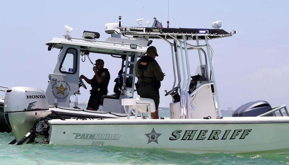 Members of the Okaloosa County Sheriff marine unit patrol the waters of Crab Island earlier this year.