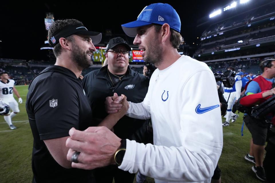 Philadelphia Eagles head coach Nick Sirianni, left, greets Indianapolis Colts head coach Shane Steichen after an NFL preseason football game Thursday, Aug. 24, 2023, in Philadelphia. (AP Photo/Matt Rourke)